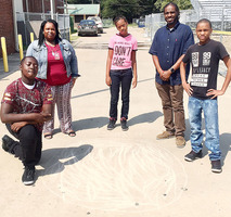 Hunt, students prepare for eclipse, study model of Solar System