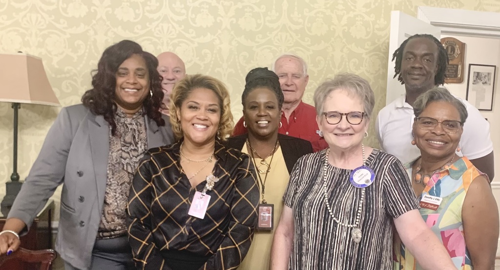 Lions Club members with Supt. Dr. Veronica Perkins